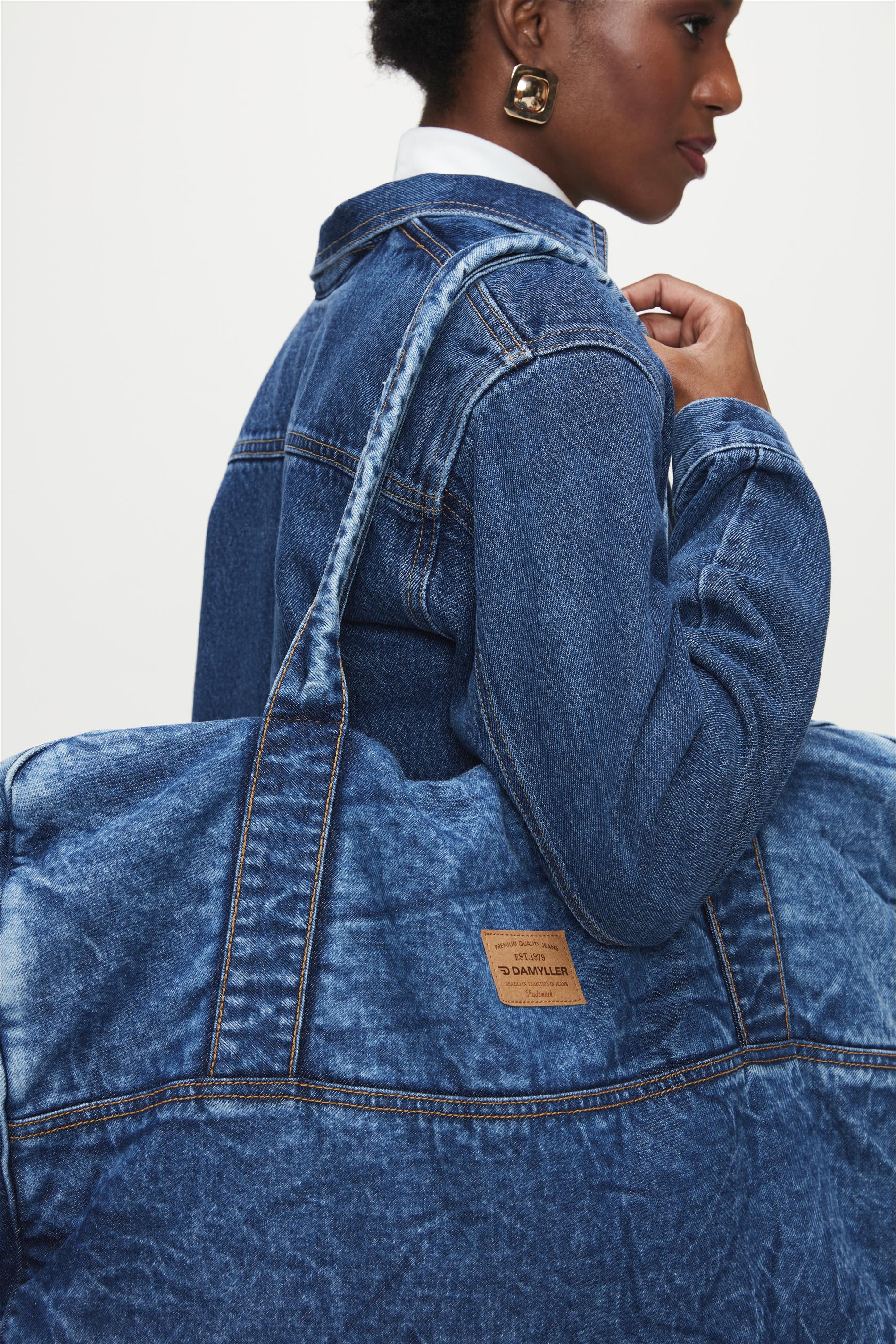 Mochila best sale jeans damyller